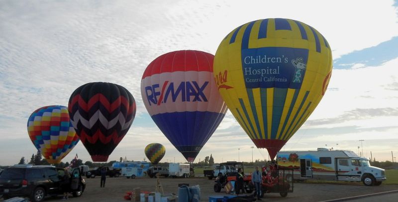 Cheers and RE/MAX balloons at Color the Skies